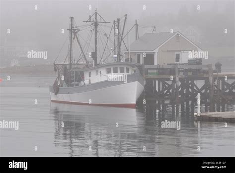 Calm Restful Scene In Coastal Maine Fishing Trawler Anchored