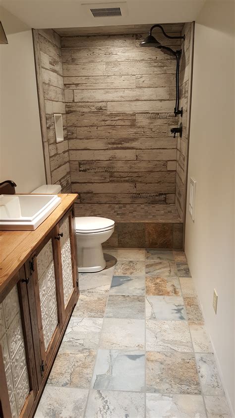 From the floors to the ceiling, tile is a great option for any bathroom. Stone | Albany Tile, Carpet & Rug