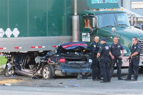 Two Critically Injured After Car Crashes Into Semi Truck