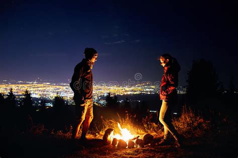 Romantic Couple Near Campfire At Starry Night Stock Photo Image Of