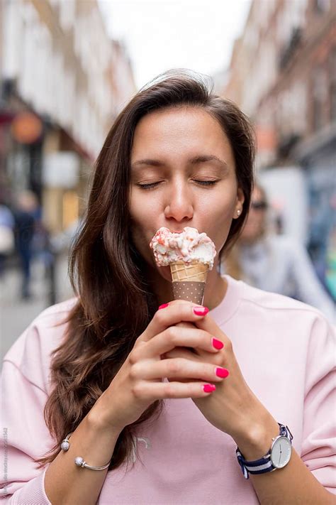 Beautiful Young Woman Eating Ice Cream In Covent Garden London By Mem