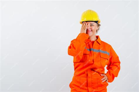 Free Photo Firewoman In Her Uniform With A Safety Helmet