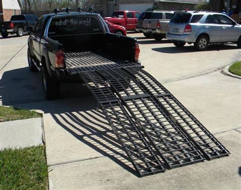 This extra wide system makes. Black Widow Motorcycle Ramp - Harley Davidson Forums