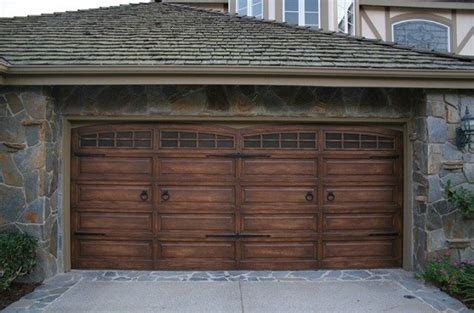 Prepare the garage door by rubbing down with either coarse sandpaper or a wire brush. Wooden Garage Doors Design & Buying Tips | Home Interiors