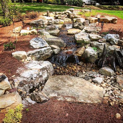 Pondless Water Featureflagstone Patio And Fire Pitmossrock Seating