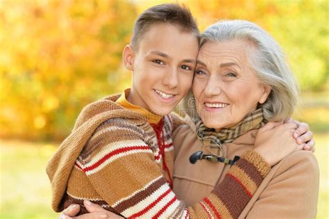 Close Up Portrait Of Happy Grandmother And Grandson Posing Stock Image