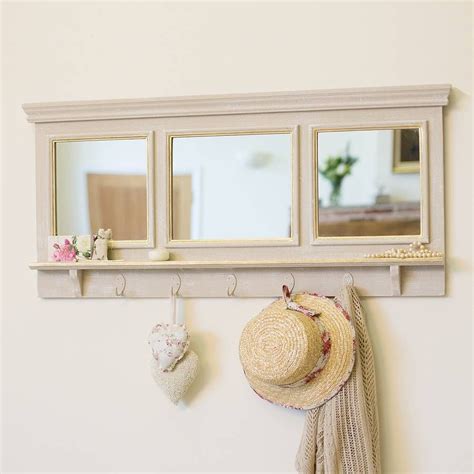 Measuring 15.5'' h x 42'' w x 11.25'' d, it offers three double hooks and three cubbies for scarves, keys, mail, and the like. Grande Mirror With Hooks | Mirror with hooks, Entryway ...