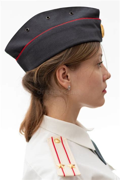A Beautiful Young Female Russian Police Officer In Dress Uniform In A