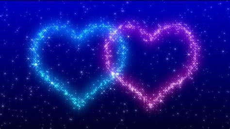 Two Hearts Shaped Like Stars Against A Blue Background