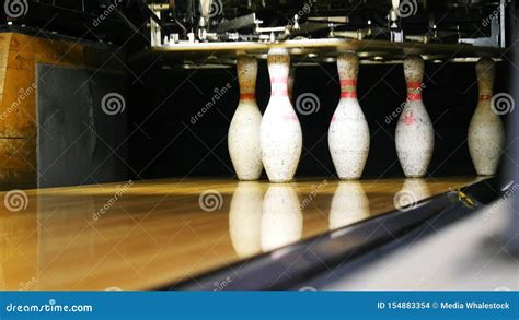 View Of Bowling Pins Standing In Th End Of Bowling Alley And Bowling