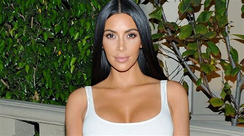 Kim Kardashian Has A Fashion Emergency When Makeup Gets On Her Tiny
