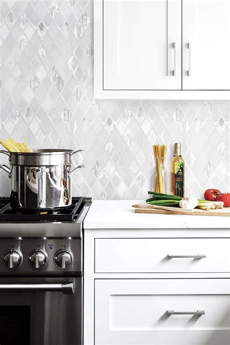 Pair this countertop with a brightly colored backsplash, while keeping the rest of the kitchen simple. Elegant White Rhomboid Backsplash Tile | Backsplash.com ...