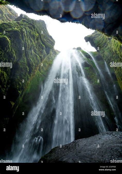 Low Angle Photography Of The Hidden Refreshing Gljufrabui Waterfall