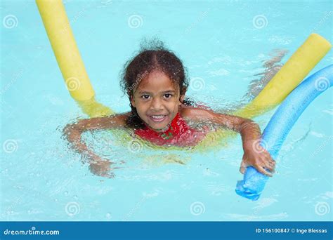 Multiracial Ethnic Girl Child Learning To Swim Stock Image Image Of