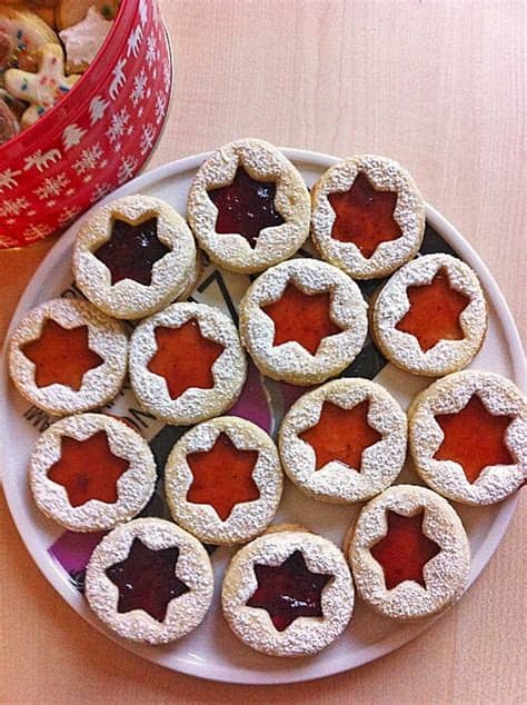 Originally, these delicious bikkies (biscuits) were lovingly baked and sent in care packages to our soldiers at war. Spitzbuben Cookies - German Christmas Tradition • Best ...