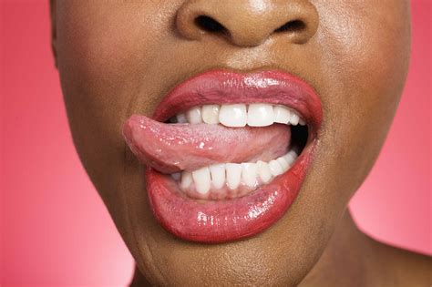 Close Up Of Woman Sticking Out Tongue Bury Dental Centre