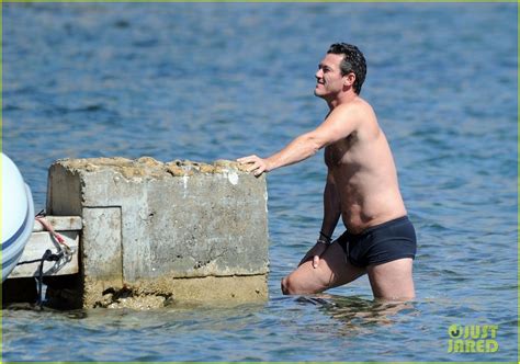 Luke Evans Puts His Shirtless Physique On Display In Ibiza Photo