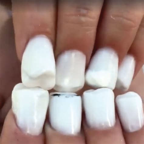 teeth nail art is happening this video shows how they re made and we want to know what s the
