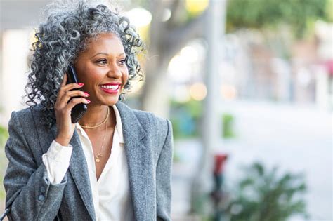 Beautiful Mature Black Woman Talking On Phone Stock Photo Download