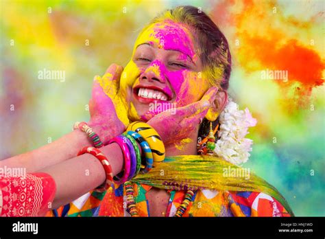 Portrait Of Young Indian Woman Celebrating Holi Color Festival Stock