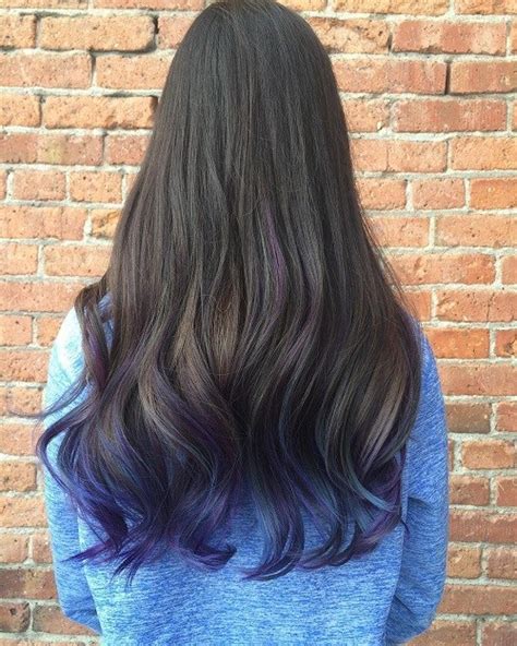 This black hair with purple highlights are very edgy/spunky, very modern, but not too loud! 40 Fairy-Like Blue Ombre Hairstyles
