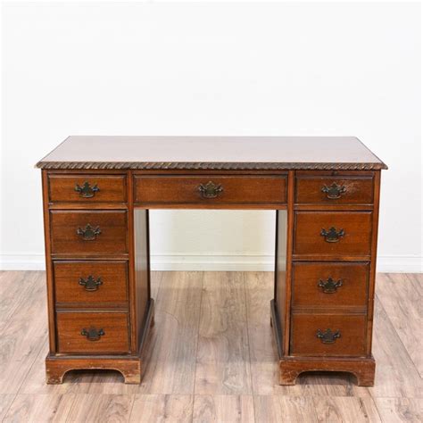 This Vintage Kneehole Desk Is Featured In A Solid Wood With A