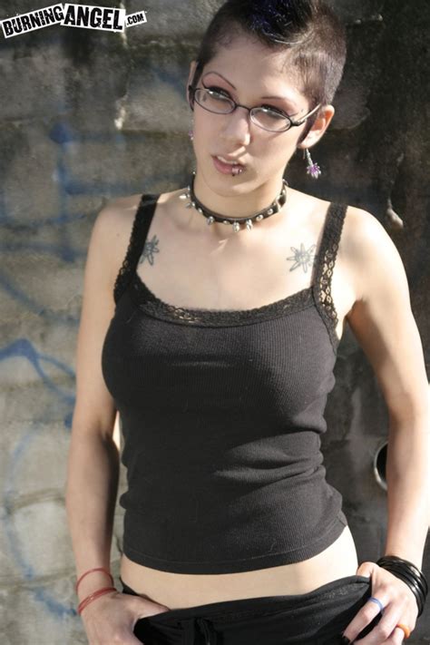 Sexy Goth Girl With Glasses And Mohawk Shamelessly Exposes Her Pussy