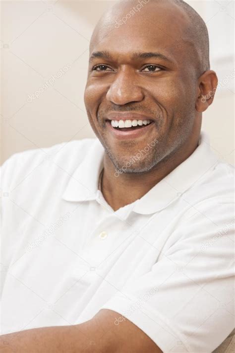 Happy Handsome African American Man At Home Stock Photo By ©dmbaker