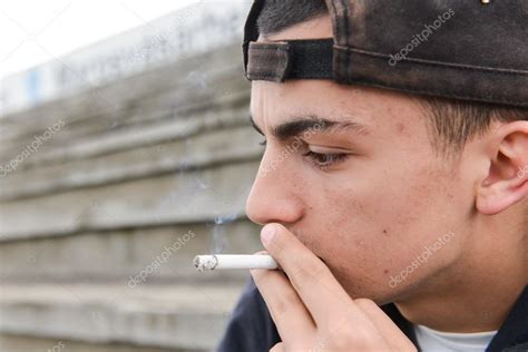 Teenage Boy Smoking Cigarette Outdoor Concept Of Young People W