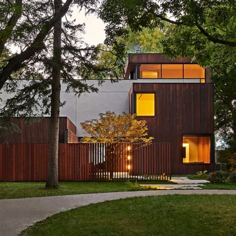Dmac Creates Michigan Lake House With Cantilevered Ash Clad Volumes