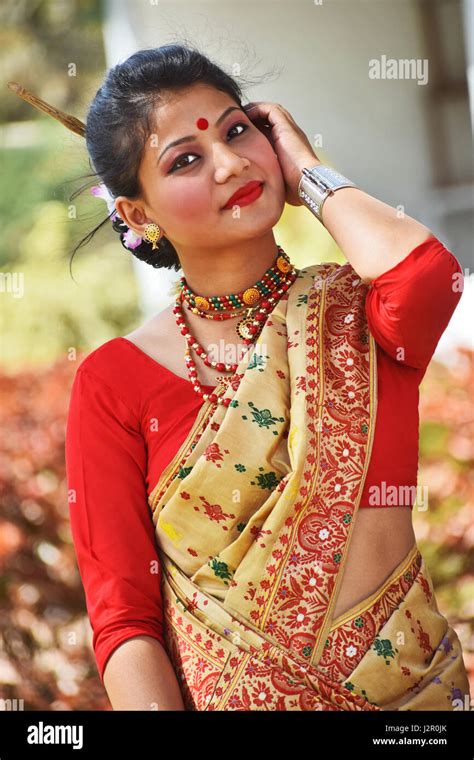 Assamese Girl In Traditional Attire Posing With A Dhol 45 Off