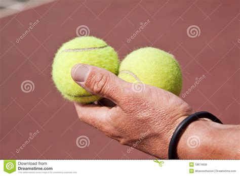 Tennis Player Holding Two Balls In His Hand Stock Photo Image Of Body