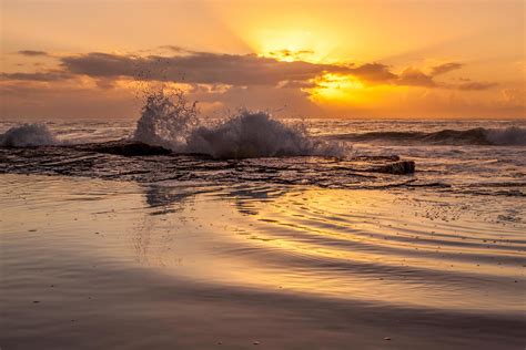 Ocean Waves Crashing On Shore During Sunset 1432941 Stock Photo At Vecteezy