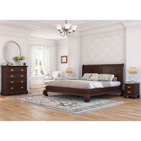 The mahogany sleigh bed frame has wooden slats and fits a queen sized mattress and boxspring. Oraibi 4 Piece Mahogany Wood Bedroom Set