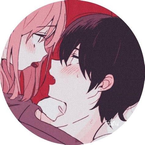 Two Anime Characters Kissing In Front Of A Red Circle With The Word Love Written On It