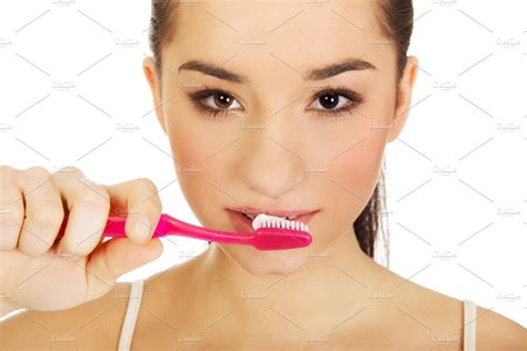 Young Woman Brushing Her Teeth High Quality People Images ~ Creative