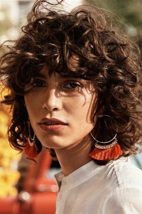It shrinks, curls and occasionally gets. 25 Best Curly Hairstyles With Bangs - Feed Inspiration