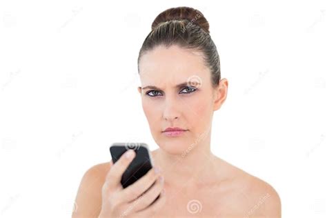 pretty woman holding phone looking angry at camera stock image image of model beauty 33720571