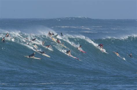 Big Waves At Waimea Bay Attract Surfers And Onlookers