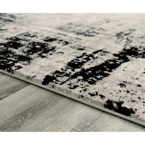 Signature Design By Ashley Contemporary Area Rugs R404922 Zekeman 53