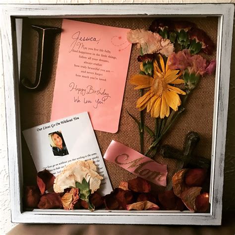 Memorial shadow box.. flowers used from the funeral dried out and a