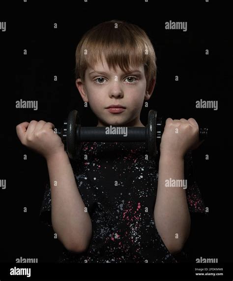Young Boy Posing For Studio Shot Stock Photo Alamy