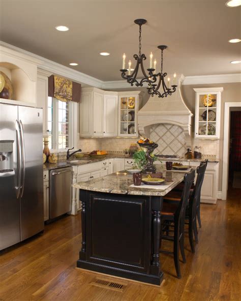 Kitchen islands are exactly what they sound like: White kitchen black island - Traditional - Kitchen - Other ...