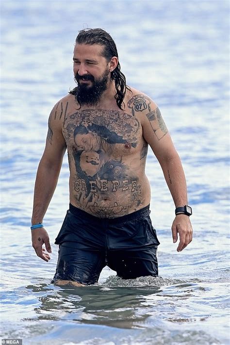 Shia LaBeouf Shows Tattoos As He Goes Shirtless For Swim In Hawaii