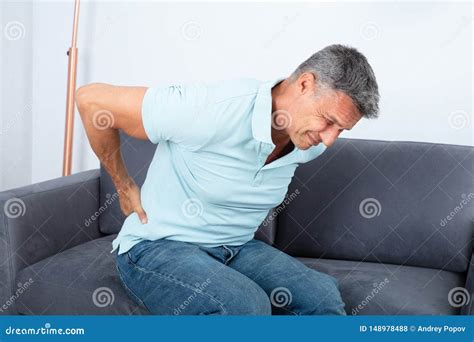 Mature Man Suffering From Back Pain Stock Photo Image Of Orthopedic