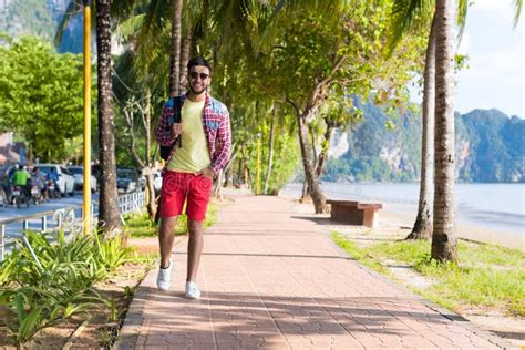 Young Hispanic Man Walking Tropical Beach Sea Holiday Guy Happy Smiling