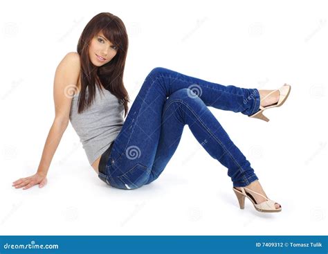 Happy Cute Girl With Blue Jeans And Smiling Looking At Camera Stock 426
