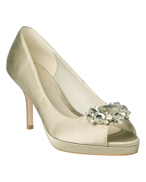 A Satin Peep Toe Shoe With Jewel Detail At Centre Features A Built In