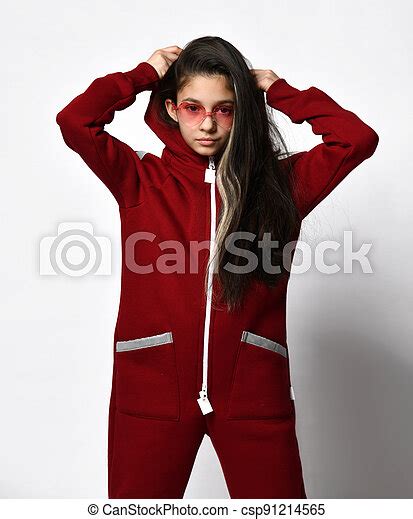 trendy lovely preteen girl model in fashion eyeglasses and tracksuit fashionable cute girl