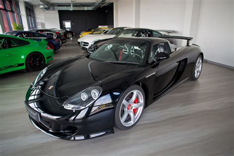 Bespoke porsche carrera gt recommissioned by porsche factory. Striking Black Porsche Carrera GT For Sale - GTspirit